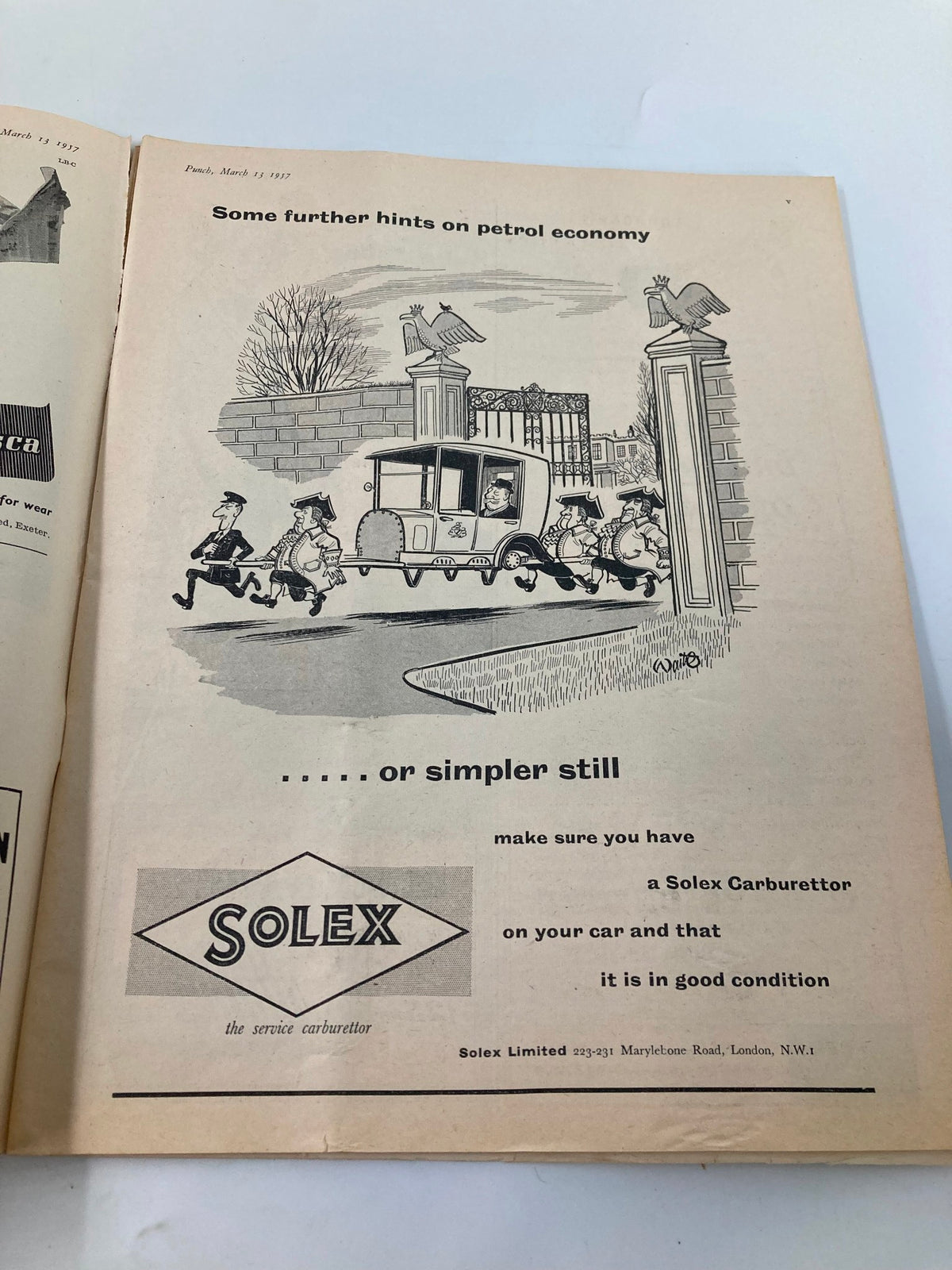 Vintage Punch Magazine March 13 1957 featuring a humorous cartoon about petrol economy and a Solex Carburettor advertisement.