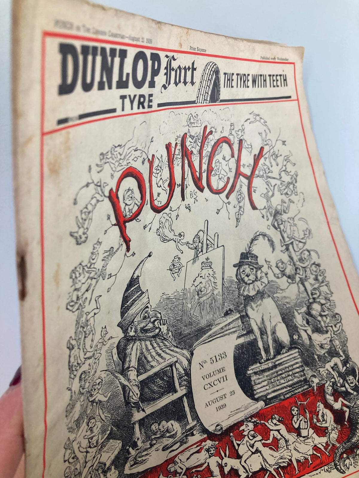 Side view of VTG Punch Magazine August 23 1939 showing the cover details, including the title 'PUNCH' and illustrations reflecting the humor of that era.