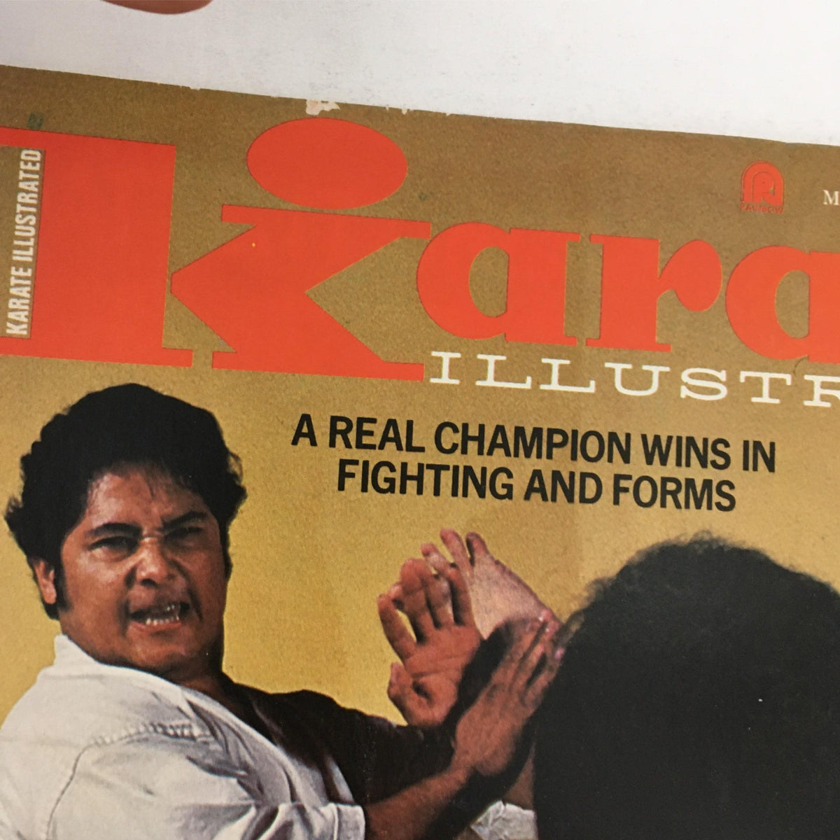 Cover of Karate Illustrated Magazine March 1978 featuring Hee Il Cho and Mike McNamara, with the headline 'A Real Champion Wins in Fighting and Forms'.