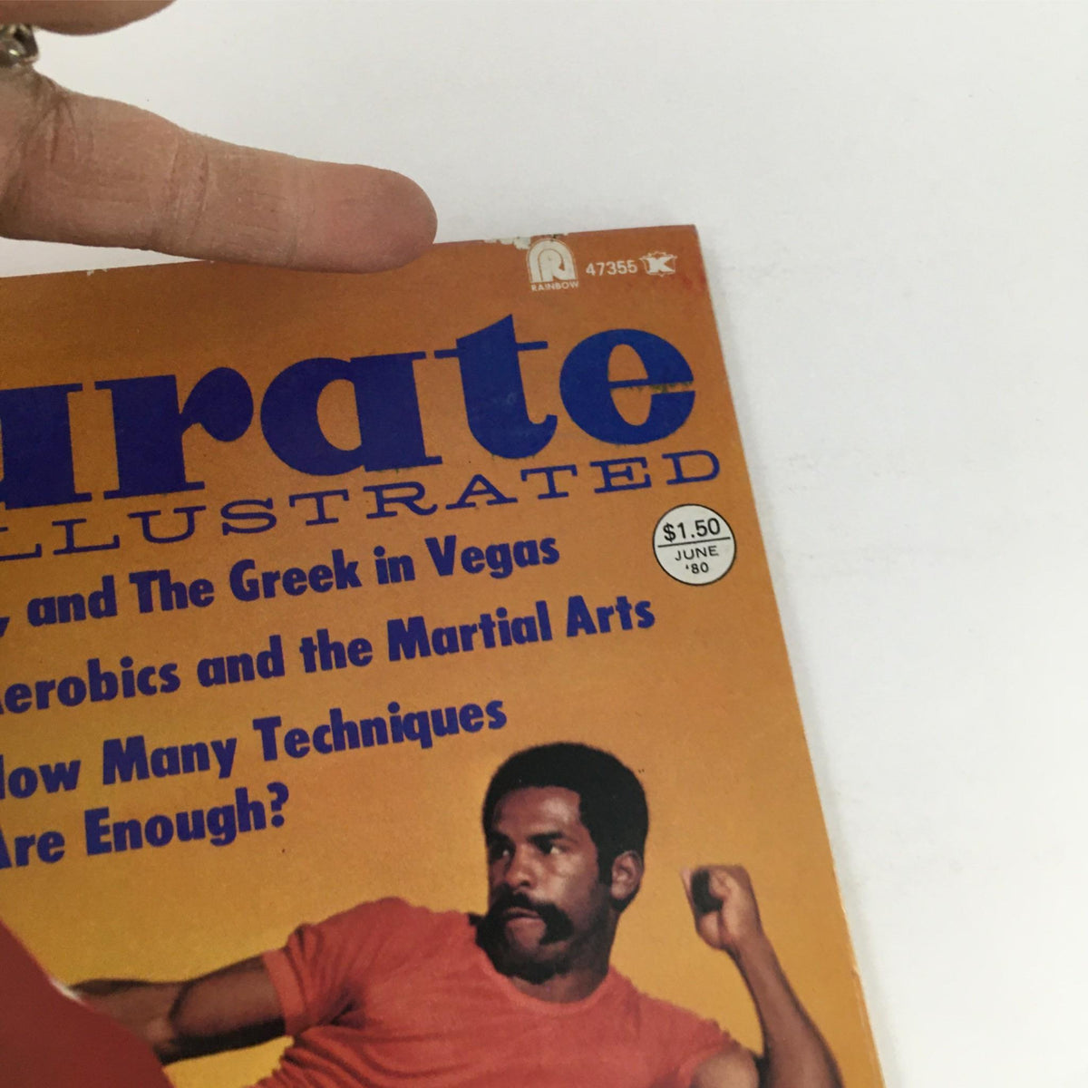 Close-up of the Karate Illustrated Magazine June 1980 cover highlighting the price and publication date, with a focus on martial arts themes and techniques.