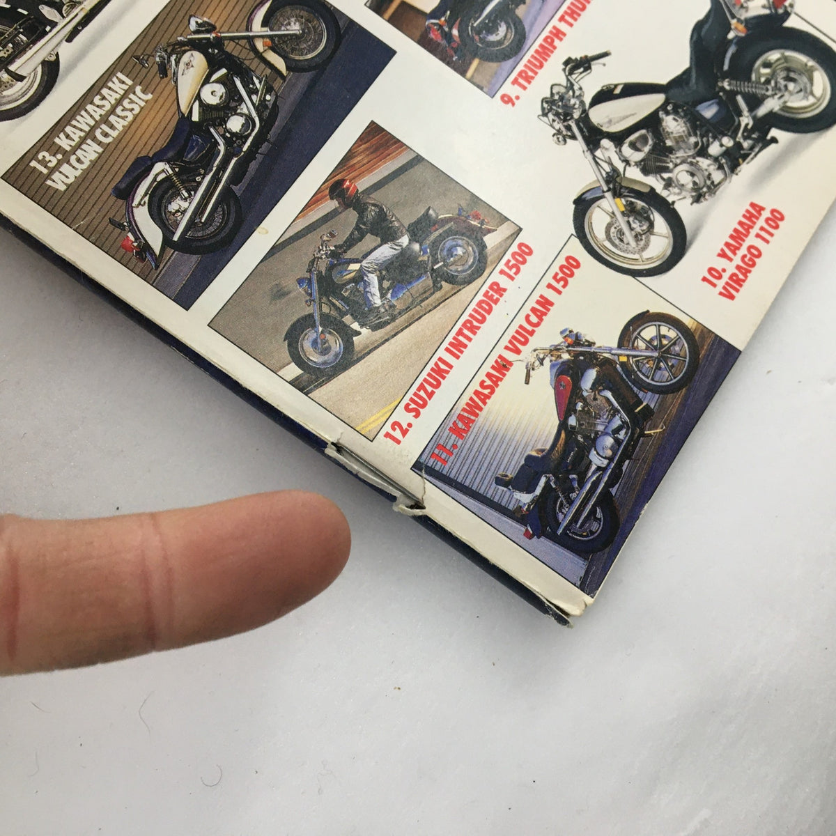 Cycle World Magazine March 1998 cover featuring motorcycle models including Suzuki Intruder 1500 and Kawasaki Vulcan 1500, showcasing vintage bikes with vivid imagery.