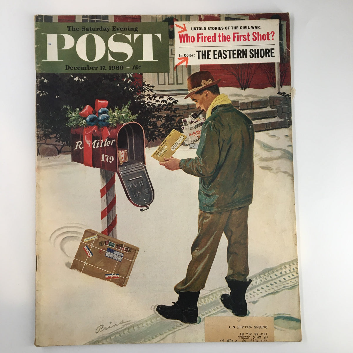 Cover of The Saturday Evening Post December 17, 1960, featuring a man reviewing mail while standing beside a decorated mailbox, showcasing the issue's story titled 'Who Fired The First Shots'.