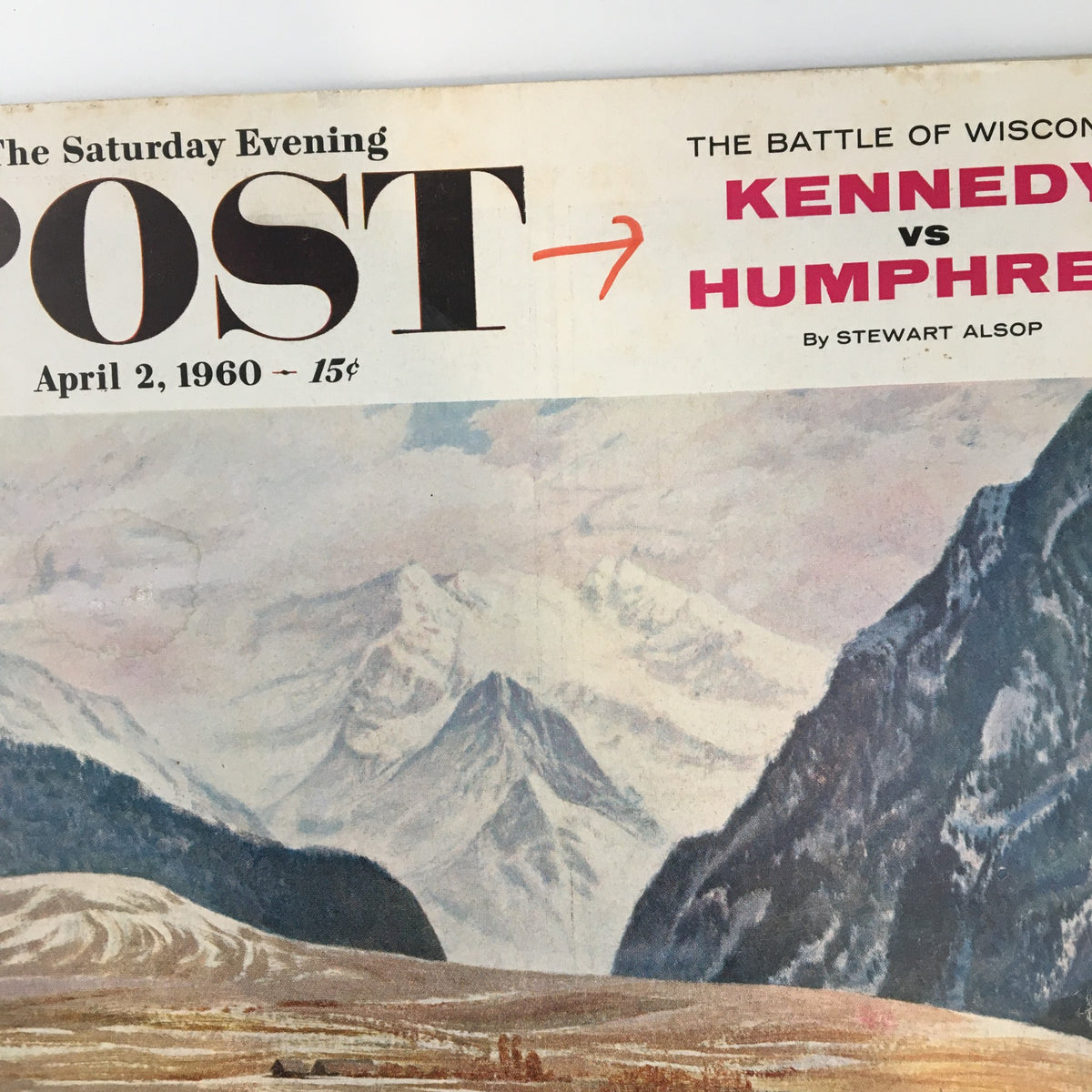 Close-up of The Saturday Evening Post cover from April 2, 1960, highlighting the title 'Kennedy vs Humphrey' against a backdrop of mountains.
