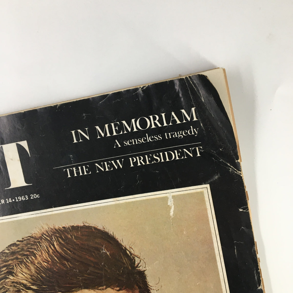 Cover of The Saturday Evening Post, December 14, 1963, In Memoriam John F. Kennedy, featuring the headline 'IN MEMORIAM A senseless tragedy THE NEW PRESIDENT' and an image depicting the impact of the event.