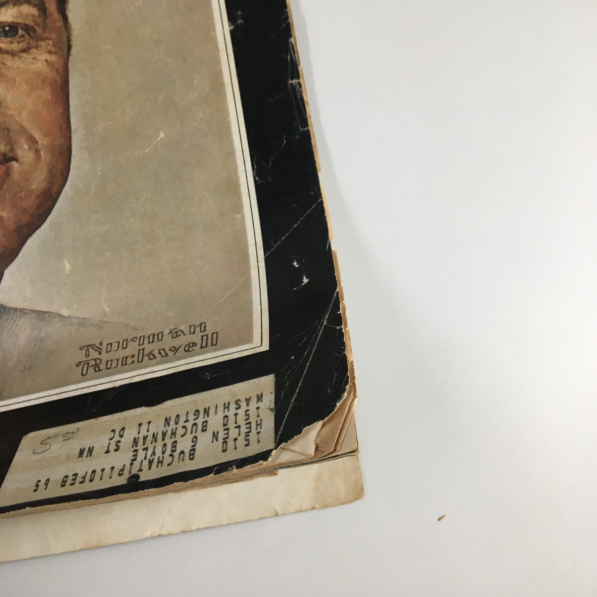 Side view of the cover of The Saturday Evening Post, December 14, 1963, In Memoriam John F. Kennedy, highlighting the magazine's original pricing and publisher details.