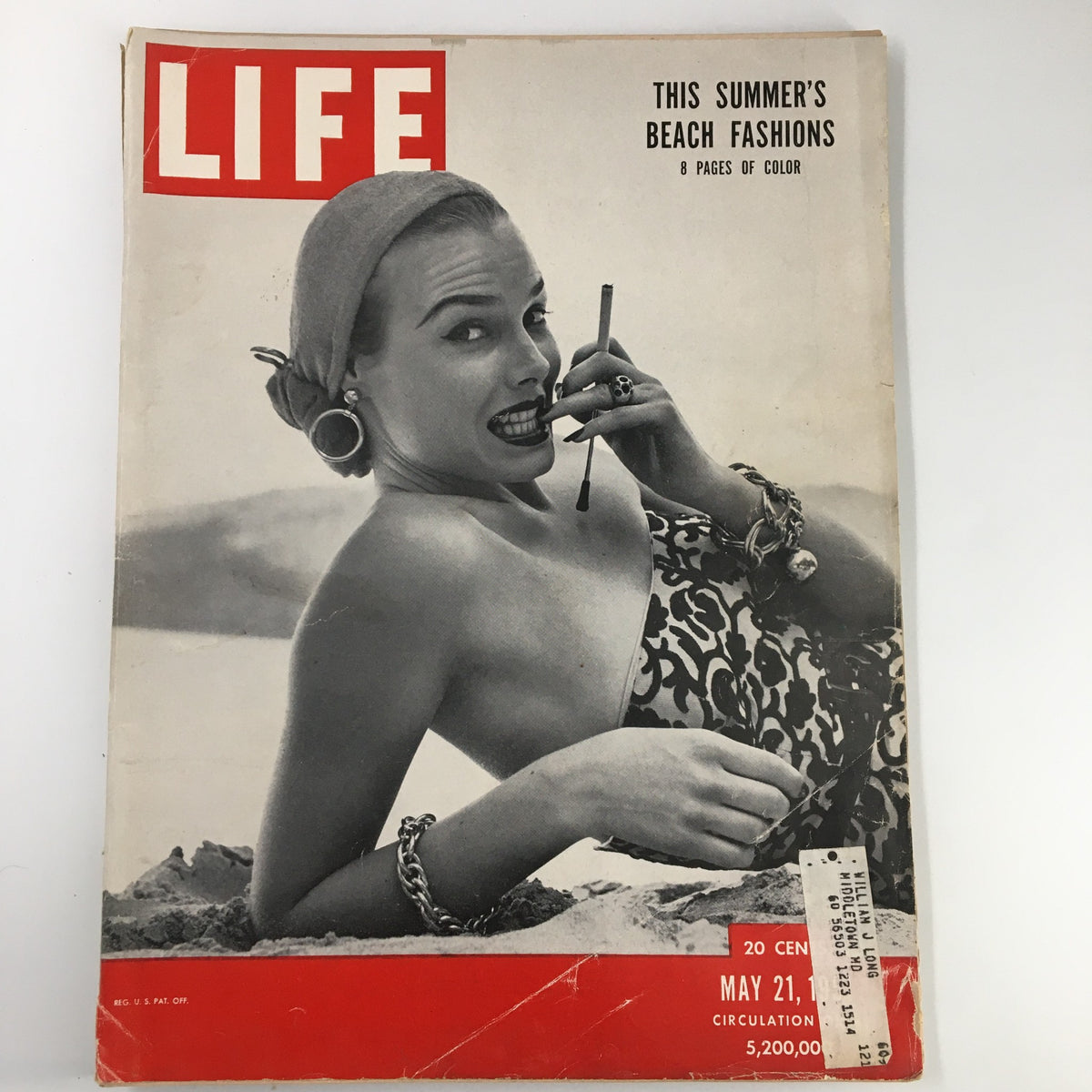 Cover of VTG Life Magazine May 21 1951 featuring beach fashions, showcasing a woman in vintage swimwear with playful expressions and a stylish hair wrap, emphasizing 1950s summer fashion.