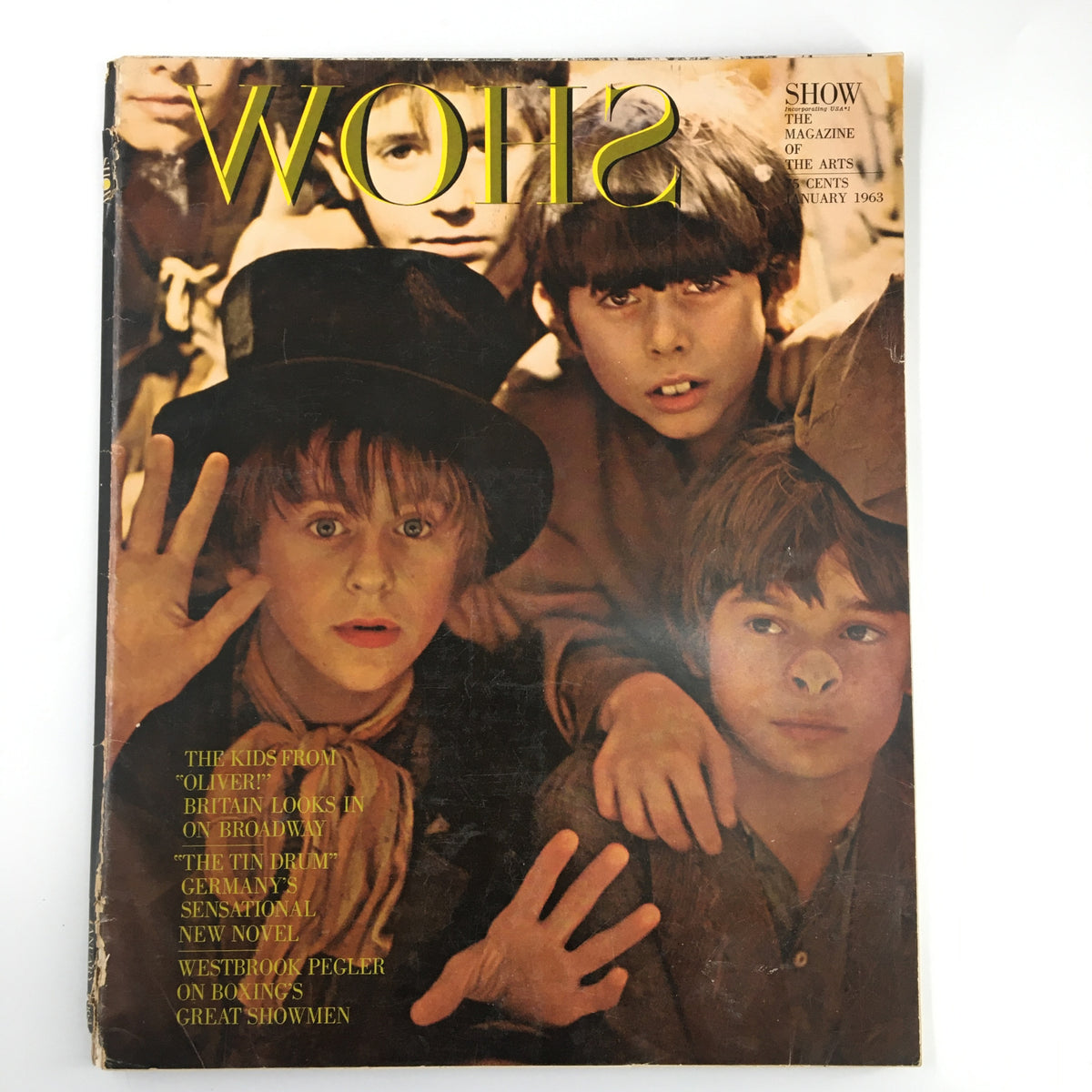 Cover of VTG Show Magazine January 1963 featuring The Kids From 'Oliver' on Broadway, showcasing nostalgic vintage theater imagery and classic Broadway elements.
