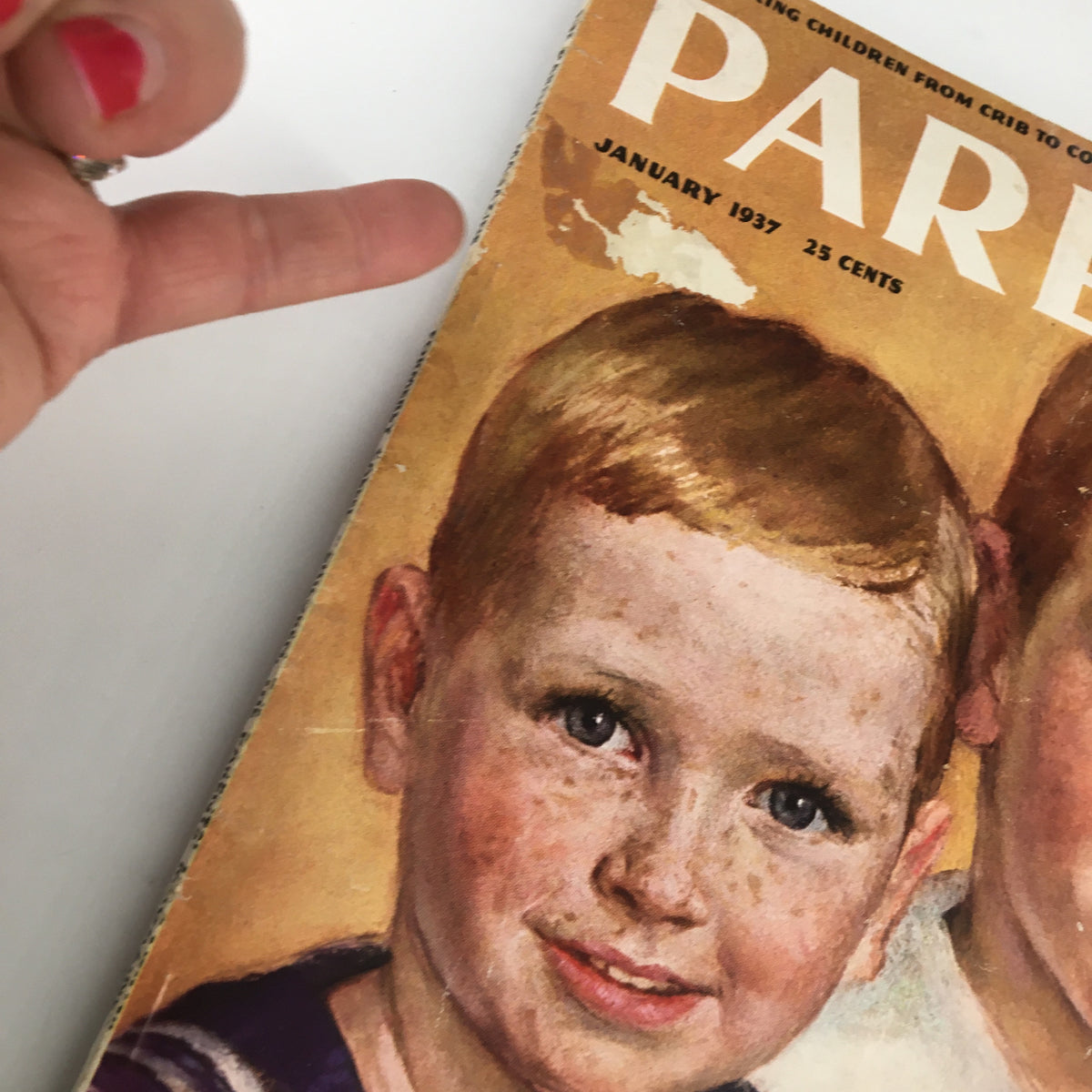 Close-up view of the cover of VTG Parents' Magazine January 1937, focusing on the faces of two boys with the headline 'My Visit To The Quintuplets.' The image captures the essence of family life in the 1930s.