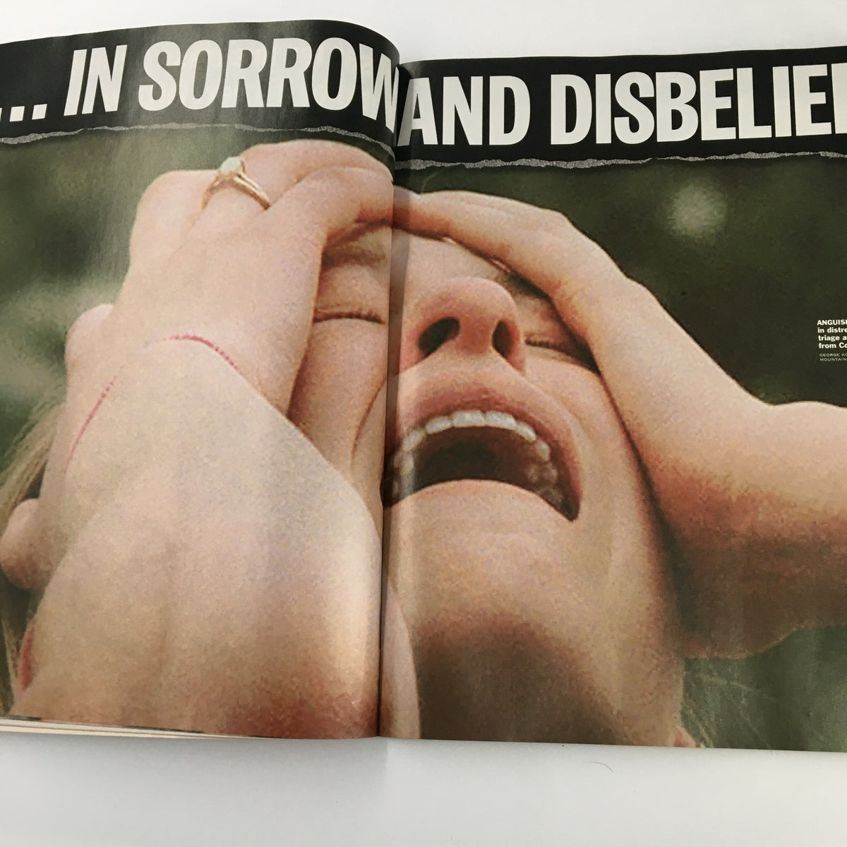 Emotionally charged image from Time Magazine May 3, 1999 depicting a person in sorrow, reflecting the impact of the tragedy.