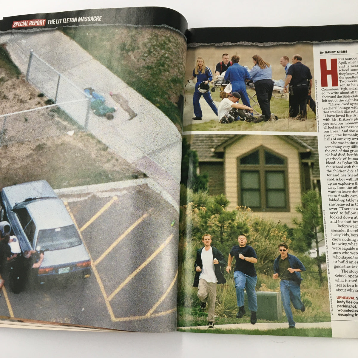 Dramatic scene in Time Magazine May 3, 1999 illustrating emergency responders at the Columbine High School shooting site.