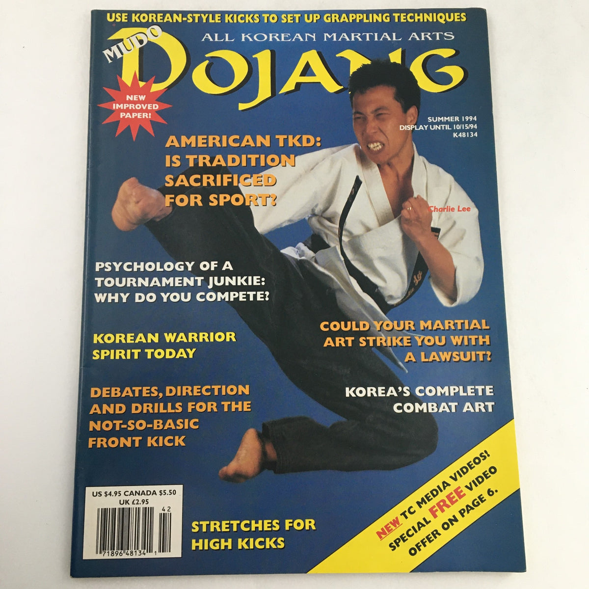 Cover of Mudo Dojang Magazine Summer 1994 featuring karate champion Charlie Lee showcasing high kick techniques, with headlines on traditional Tae Kwon Do and martial arts psychology.
