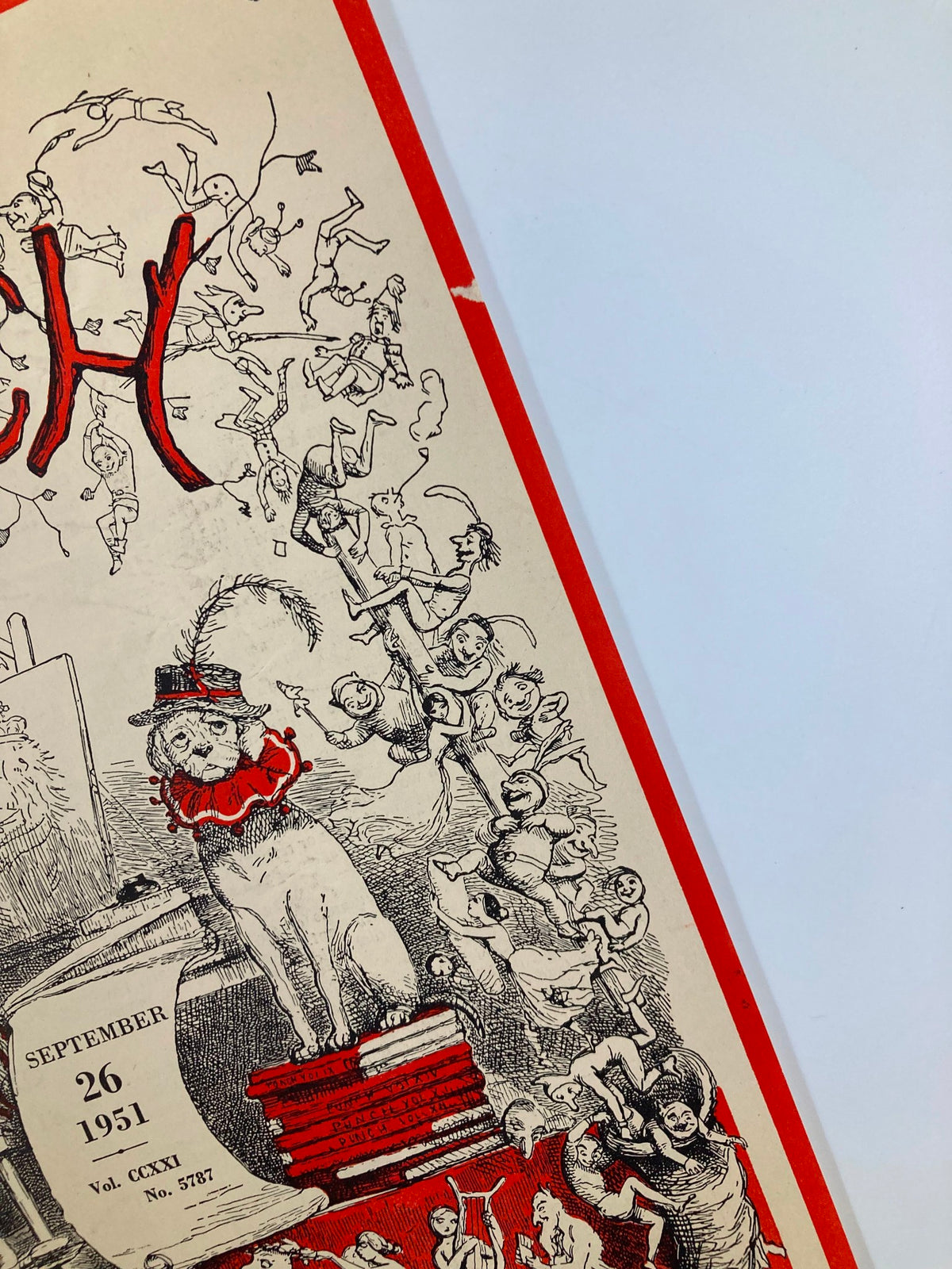Detailed view of the VTG Punch Magazine cover dated September 26 1951, highlighting a playful cat illustration amidst dynamic cartoon figures.