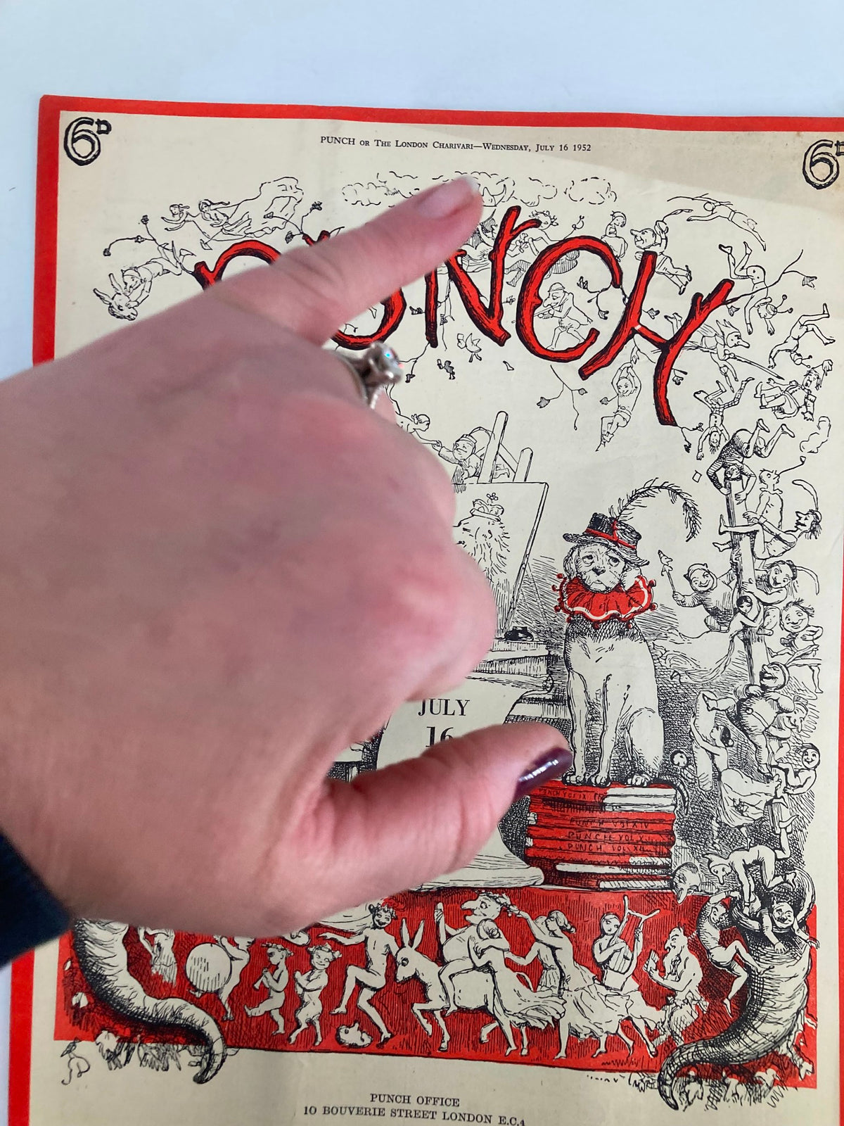 Close-up view of the cover of VTG Punch Magazine July 16 1952 #5831 Vol 223, showcasing comedic visuals and the magazine's title in bold red.