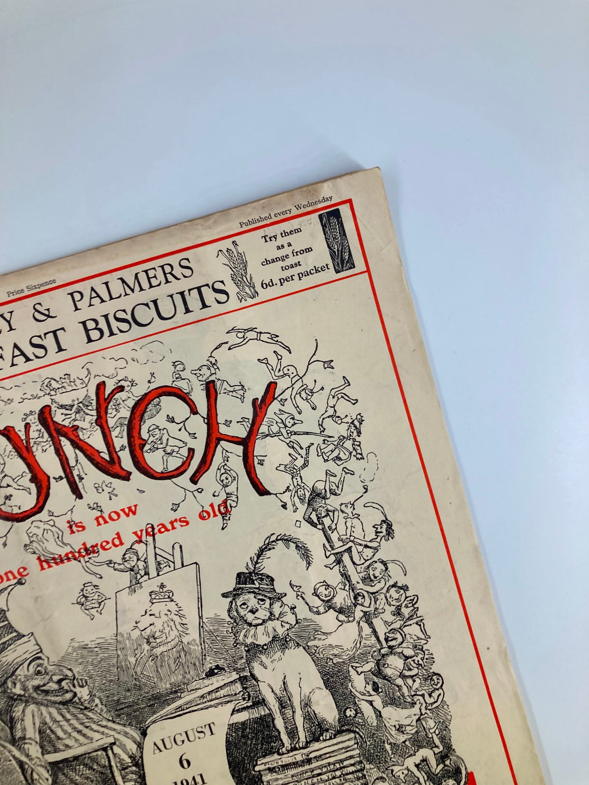 Close-up of the top corner of VTG Punch Magazine August 6 1941 #5239 Vol 201, showcasing detailed artwork and text highlighting its historical significance.