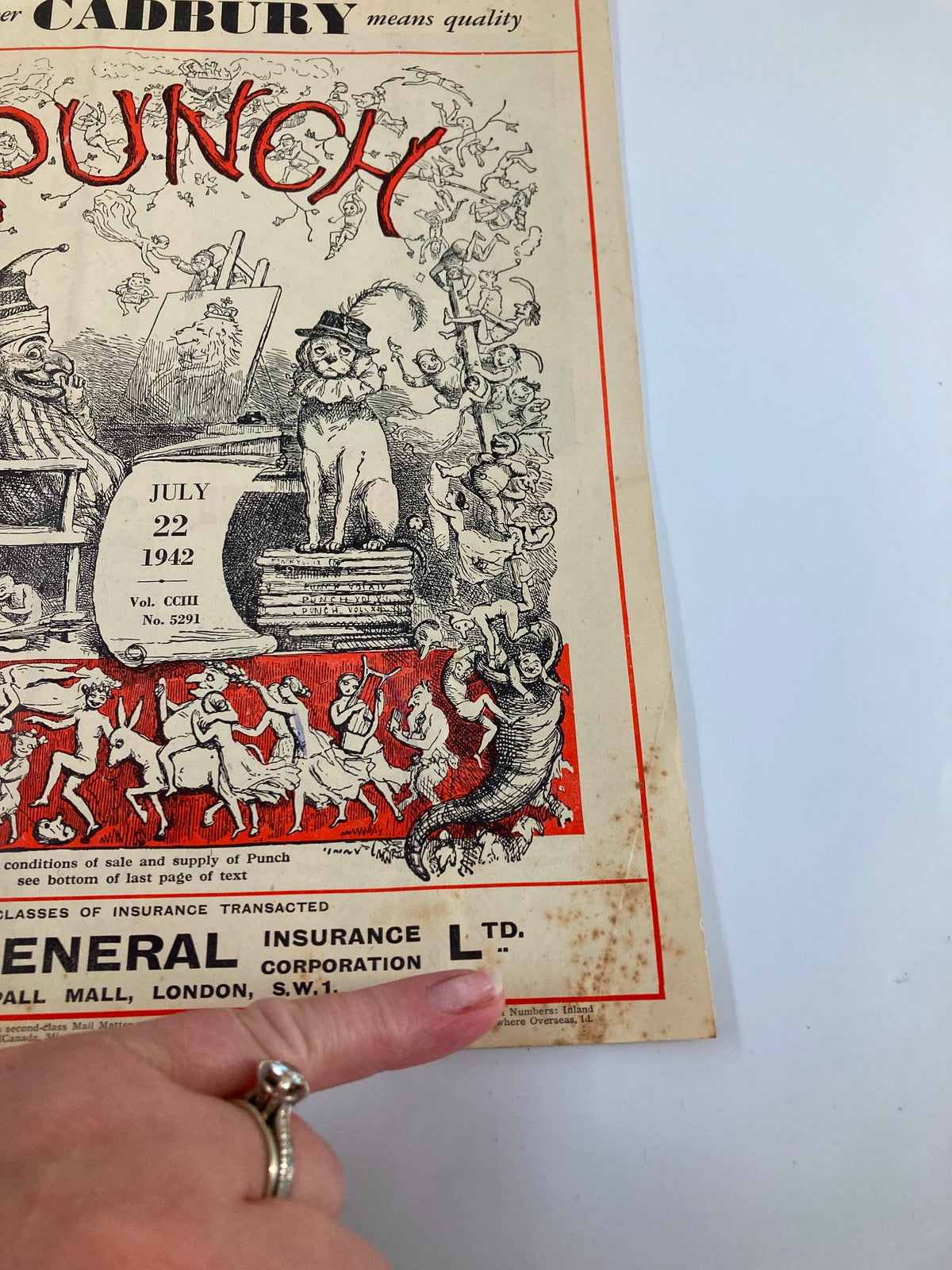 Close-up of the corner of VTG Punch Magazine July 22 1942 #5291 Vol 203 showcasing unique cartoon artwork and vintage ad.