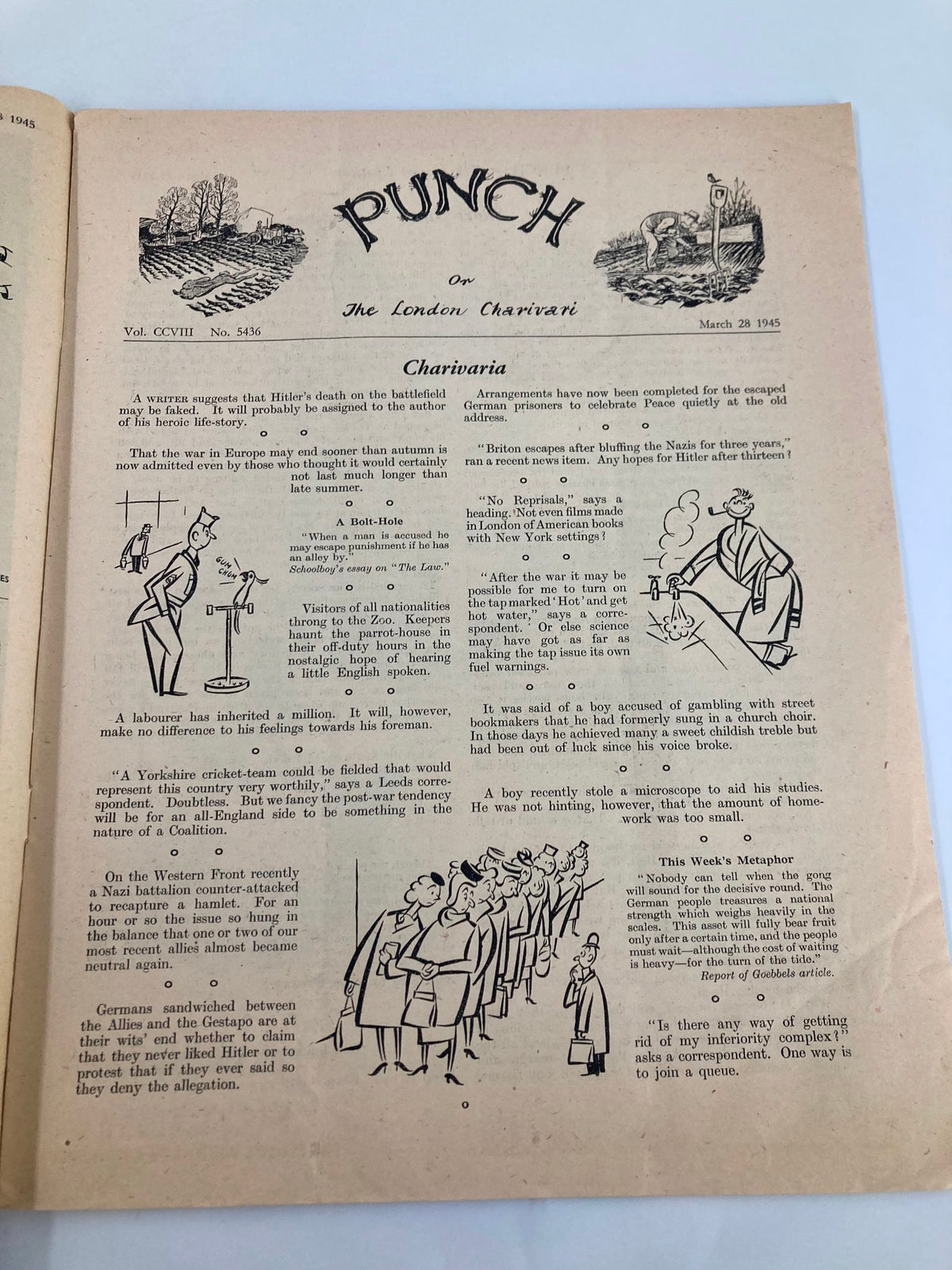 Inside page of VTG Punch Magazine March 28 1945, showcasing humorous articles and illustrations, reflecting the UK's satire during WWII.