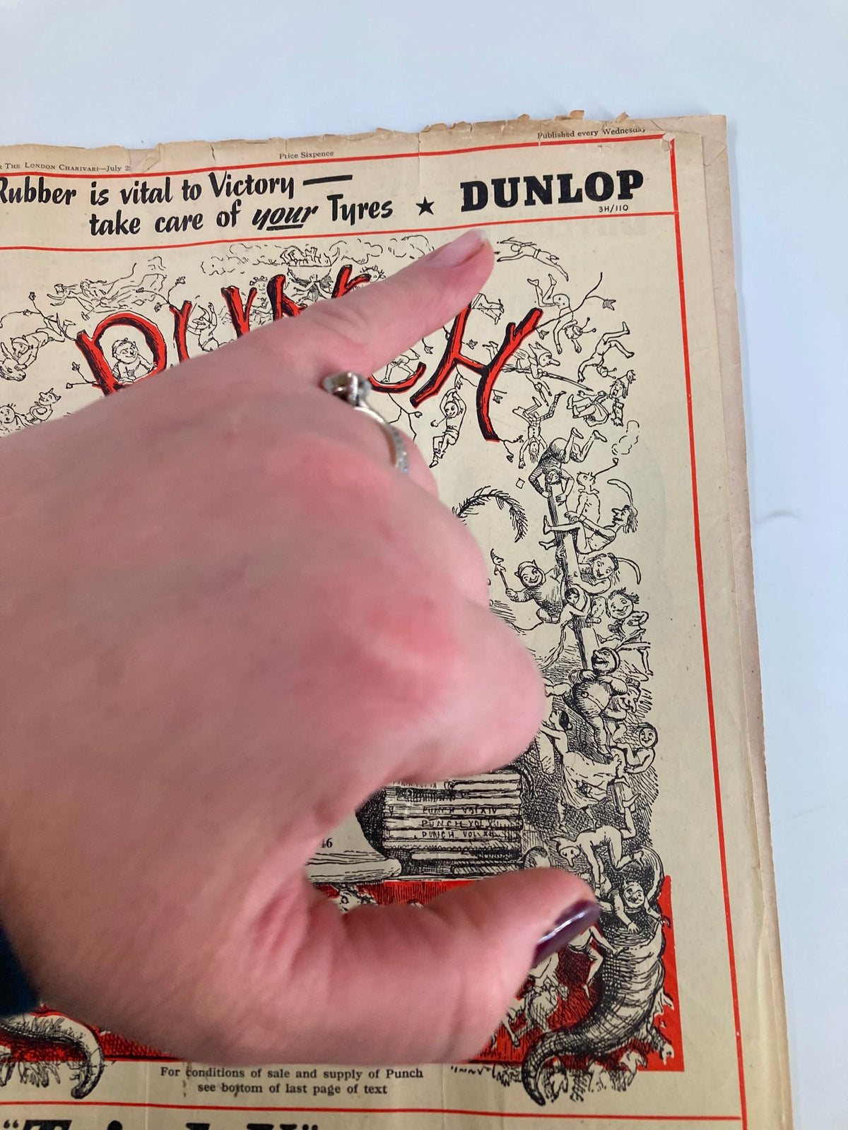 Close-up view of VTG Punch Magazine July 28 1943 #5346 Vol 205 highlighting the text and details on the cover, emphasizing the era's humor and style.