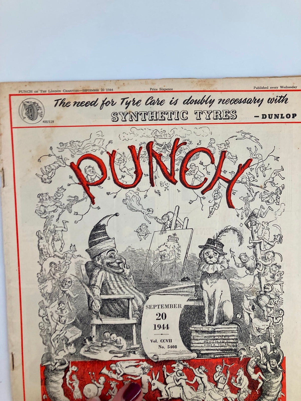 Detailed view of the cover of VTG Punch Magazine September 20 1944, highlighting its colorful title and artistic drawings related to WWII.