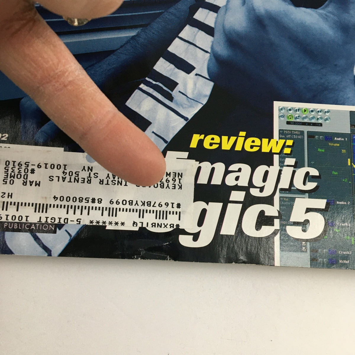 Close-up of Keyboard Magazine August 2002 cover showing part of an address label and the review section for 'magic' 5 software.