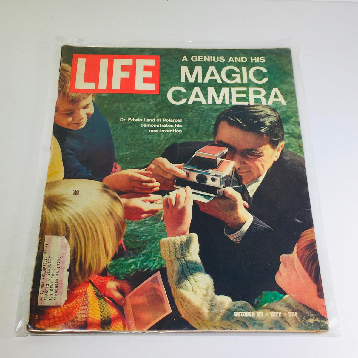 Life Magazine October 27 1972 cover featuring Dr. Edwin Land of Polaroid demonstrating his magic camera, with children watching eagerly. A nostalgic glimpse into the innovative photography of the early 1970s.