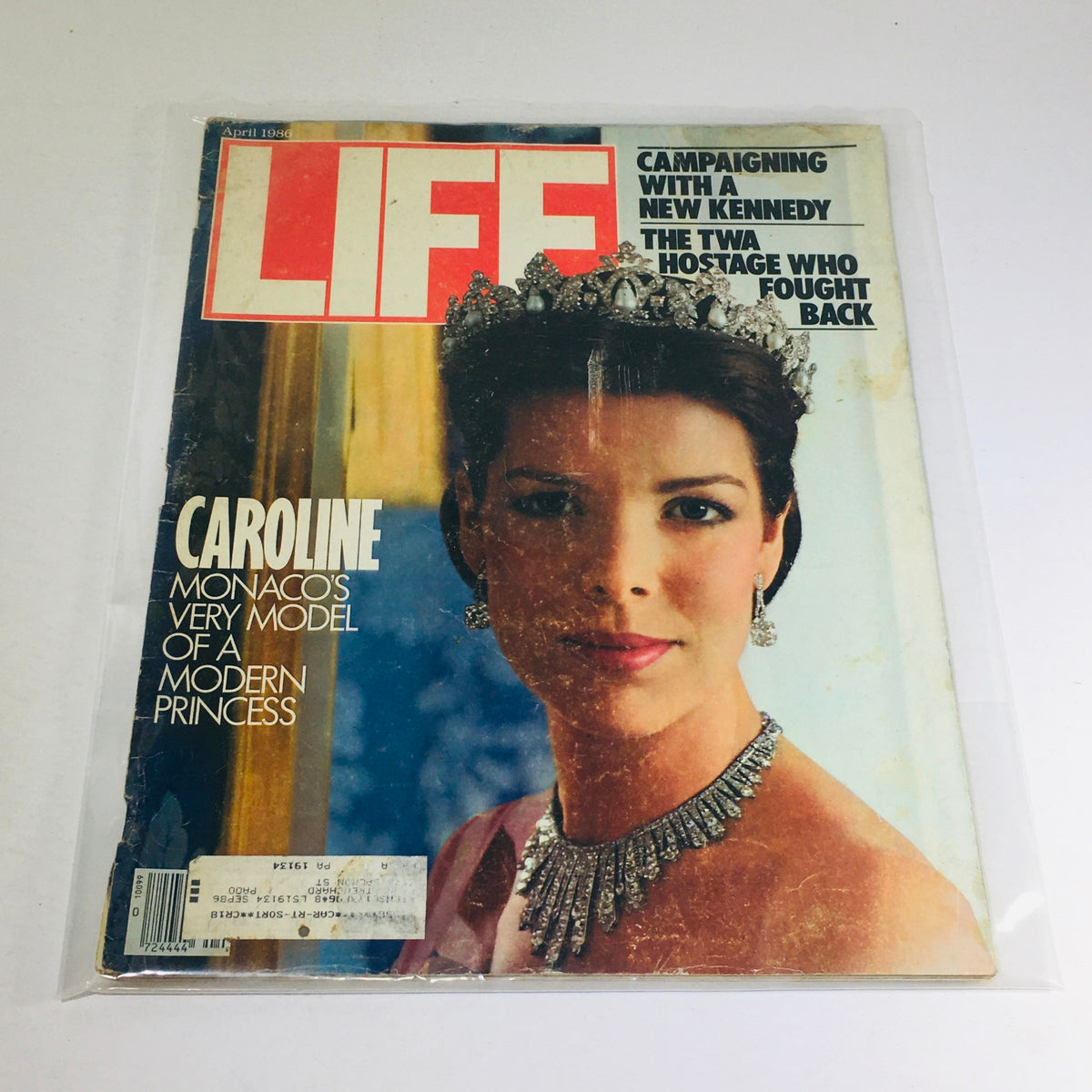 Vintage Life Magazine cover from April 1986 featuring a woman in a tiara and the title 'Campaigning With A New Kennedy / The TWA Hostage Who Fought Back'.
