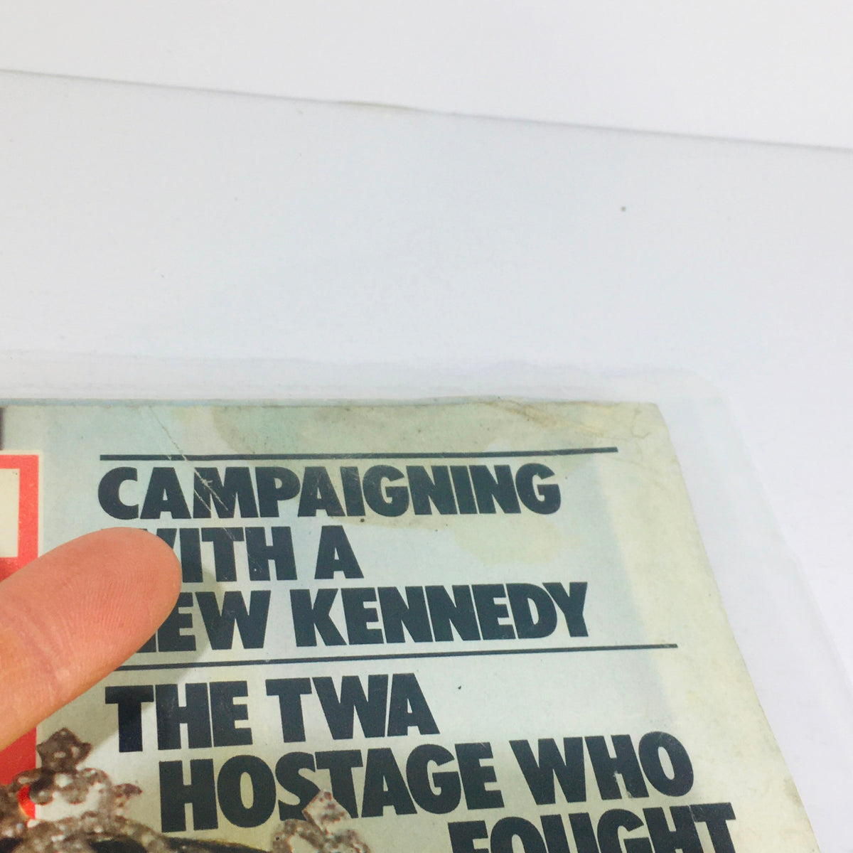 Detailed shot of the cover of the Vintage Life Magazine: April 1986, highlighting the phrase 'Campaigning With A New Kennedy' and the TWA hostage story.