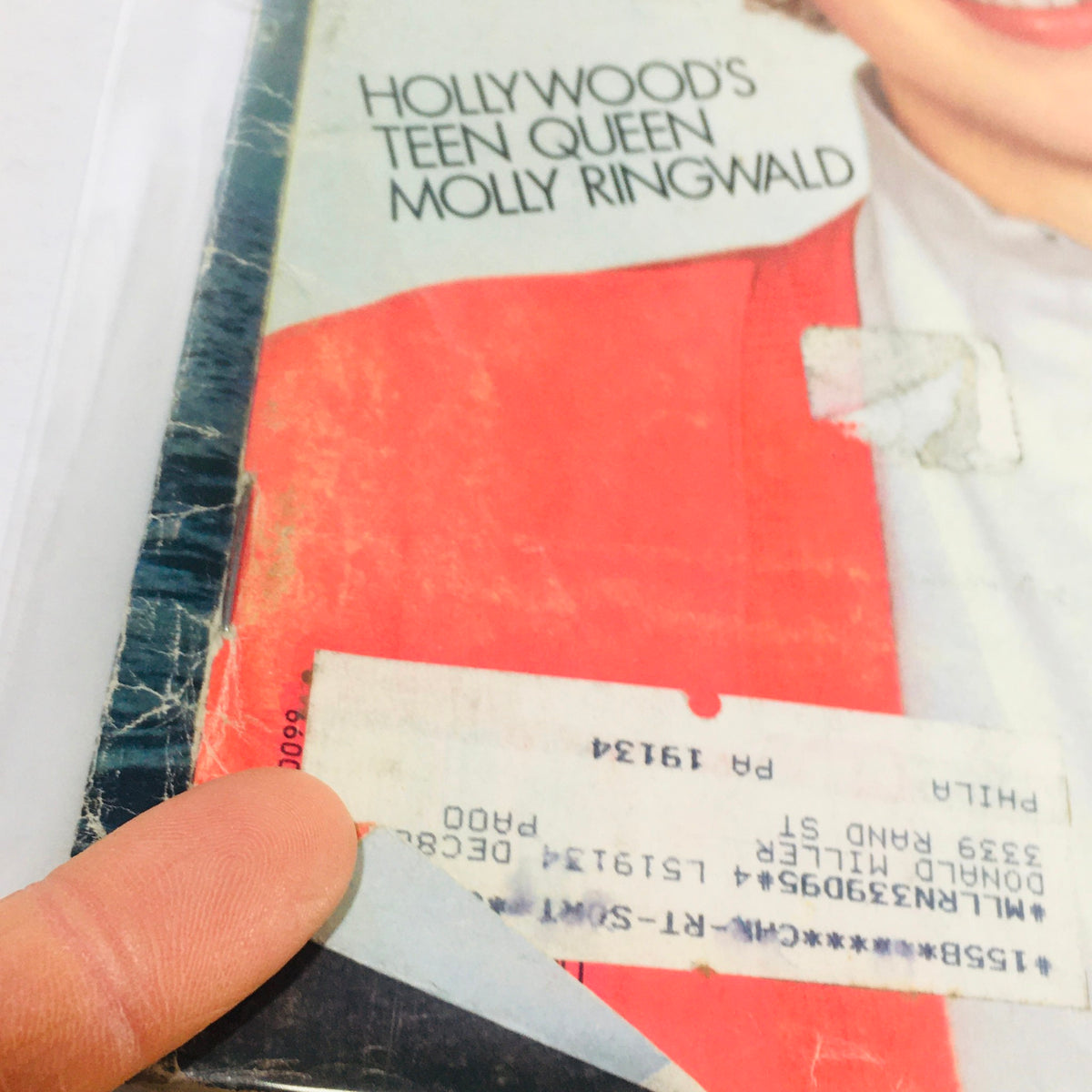 Close-up of the Vintage Life Magazine from March 1986, highlighting Molly Ringwald's cover photo and an address label on the front, reflecting its vintage charm.