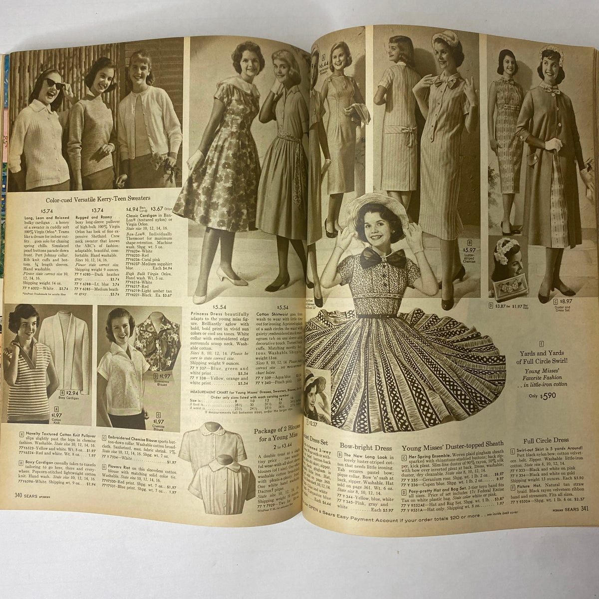 Page from the 1959 Sears Classic Spring and Summer Catalog displaying a collection of stylish dresses worn by models, highlighting 1950s fashion trends.