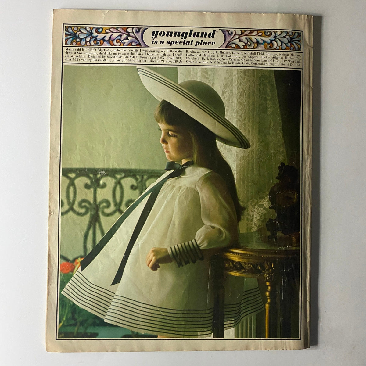 Cover page of vintage magazine featuring a child modeling a beautiful dress with a large hat, emphasizing fashion elegance in Vogue Children's Fashions - Spring Summer 1965 Catalog.