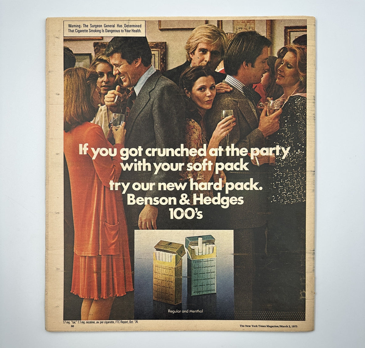 Back cover of The New York Times Magazine, March 2, 1975, featuring a lifestyle advertisement for Benson & Hedges cigarettes, depicting a social gathering with several people in conversation.