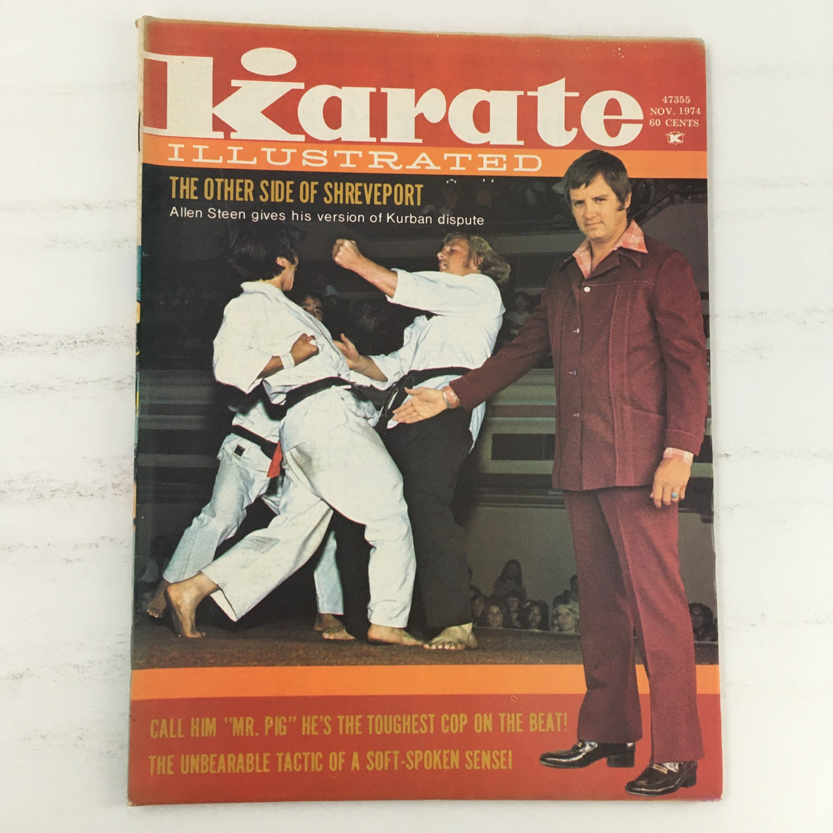 Karate Illustrated Magazine November 1974 cover featuring Allen Steen discussing the Kurban dispute and martial arts action.