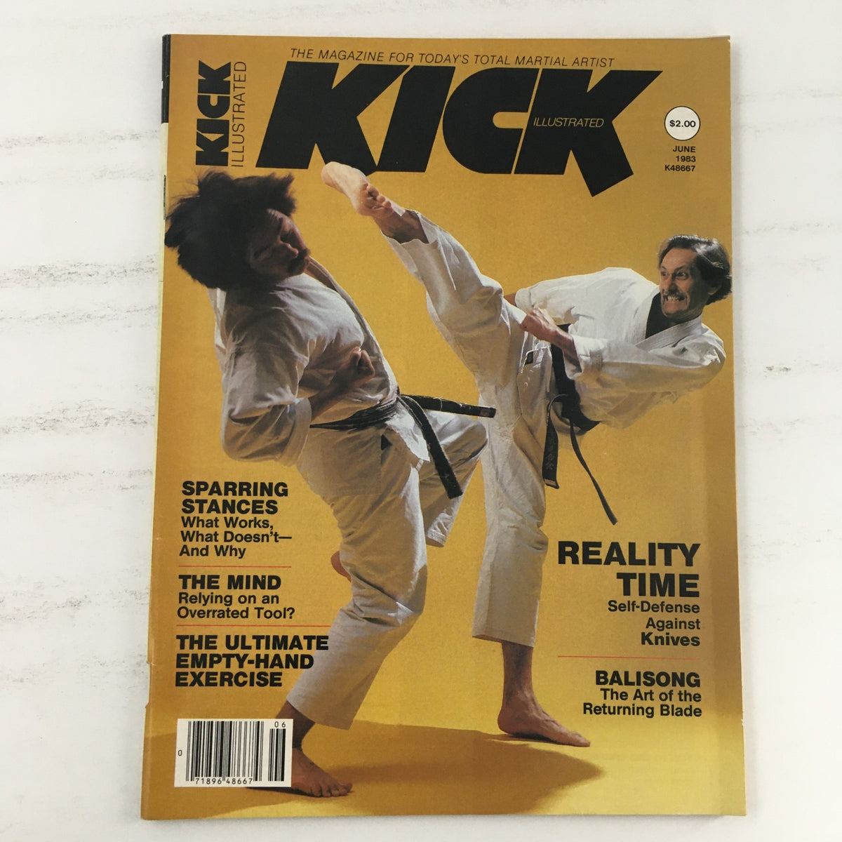 Kick Illustrated Magazine June 1983 Vol 4 #6 featuring martial artist Dan Ivan demonstrating a kick on the cover, capturing the essence of martial arts culture from the early '80s.