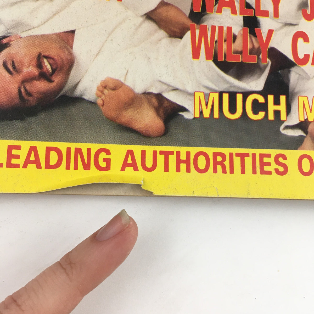 Close-up of the cover text from Dojo Magazine Fall 1992 highlighting Wally Jay and Willy Cahill as leading authorities in martial arts.