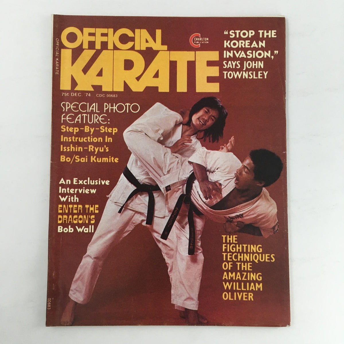 Cover of Official Karate Magazine, December 1974, Vol 6 #42 featuring a photo of martial artists demonstrating techniques. The magazine includes a feature on William Oliver and topics like Step-By-Step Instruction in Isshin-Ryu's Bo/Sai Kumite.