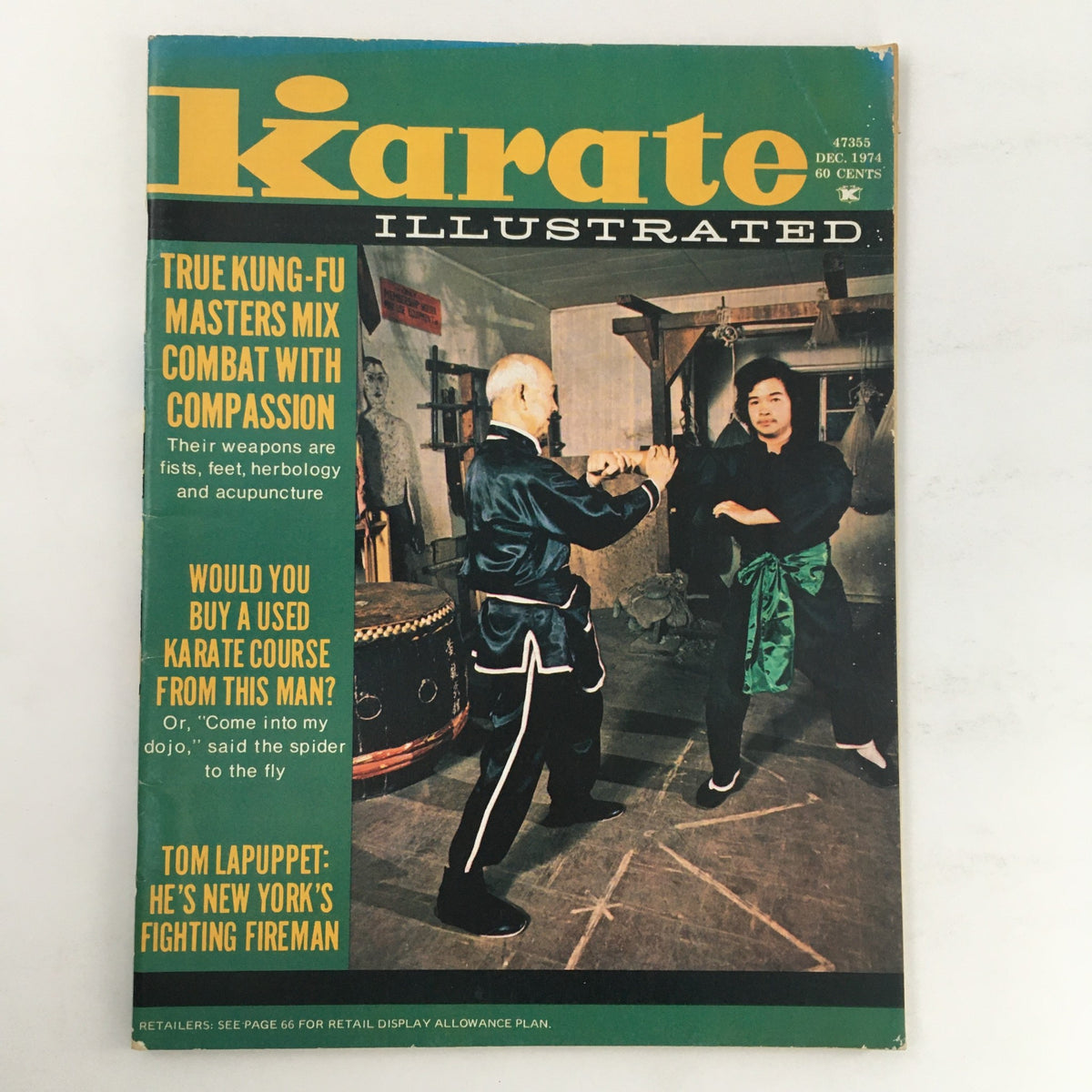 Cover of Karate Illustrated Magazine December 1974 featuring Ark Wong and Tom Lapuppet. The cover highlights articles on martial arts techniques, compassion in combat, and includes a visual of martial artists practicing.