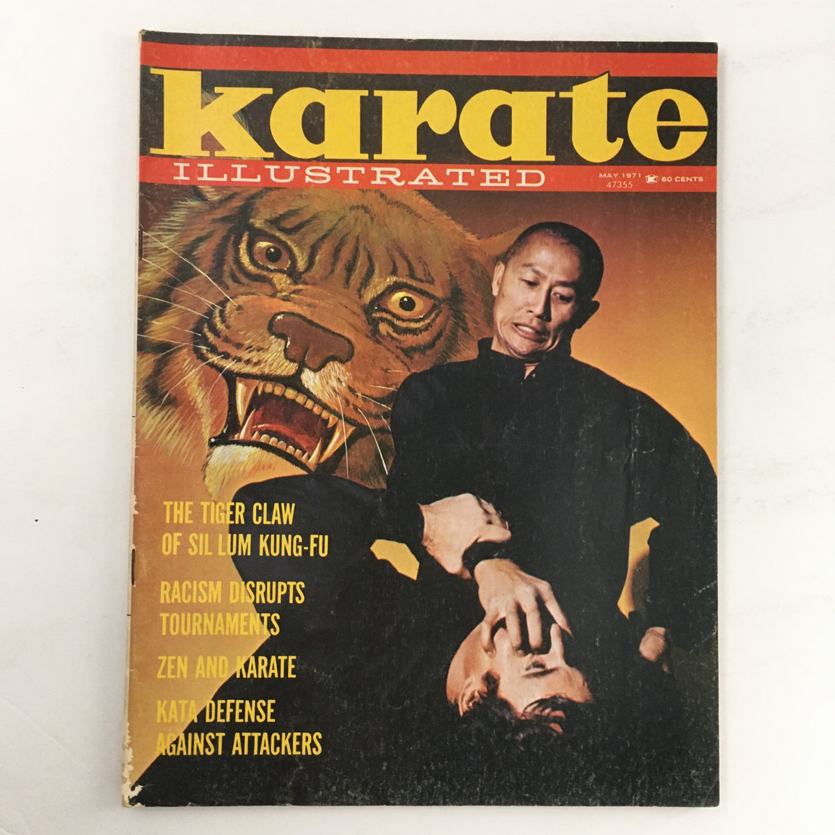 Cover of Karate Illustrated Magazine May 1971 Vol 2 #5 featuring Leo Fong and Robert Garvey, showcasing a tiger background and martial arts theme.