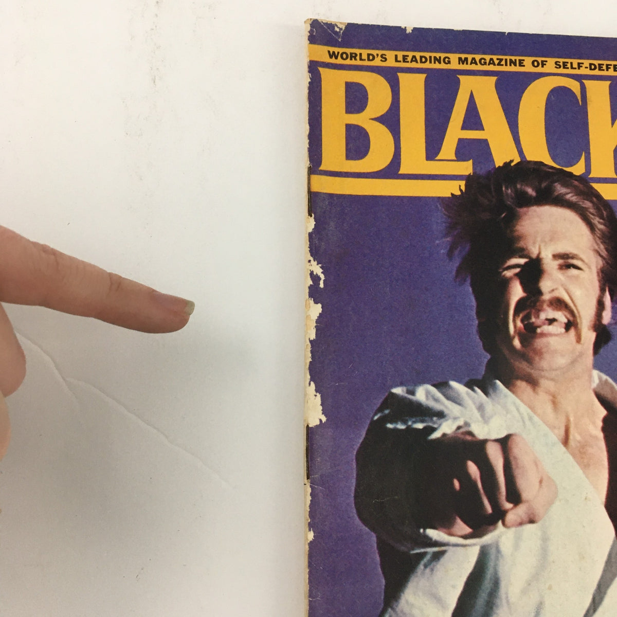Side view of the cover of Black Belt Magazine March 1971 Vol 9 #3, highlighting Tonny Tulleners' fierce expression in karate attire.