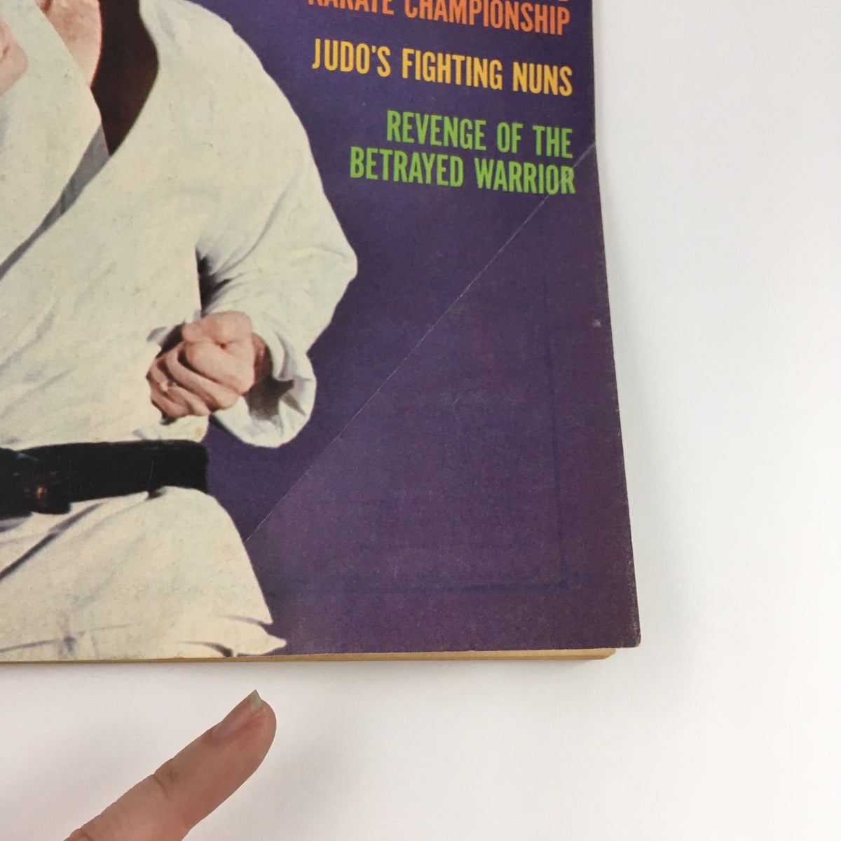 Detailed view of the cover text of Black Belt Magazine March 1971 Vol 9 #3, listing articles including Judo's Fighting Nuns and Revenge of the Betrayed Warrior.