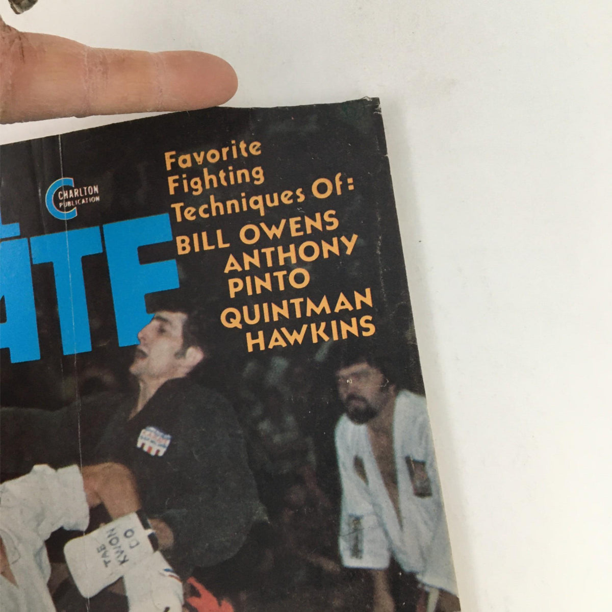 Cover of Official Karate Magazine March 1975 featuring favorite fighting techniques by Bill Owens, Anthony Pinto, and Quintman Hawkins.