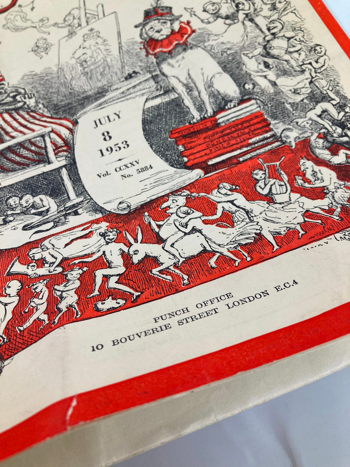 Close-up detail of the cover of VTG Punch Magazine July 8 1953, emphasizing artistic design elements with cartoon figures and publication details.