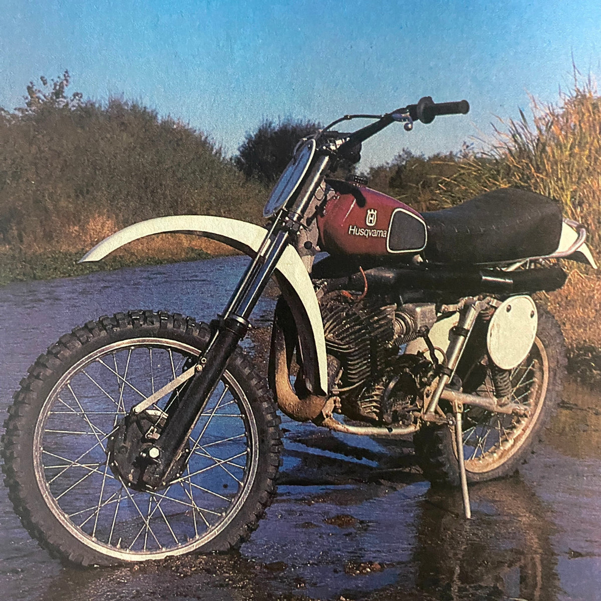 Cycle World Magazine March 1977 image featuring a Husqvarna motorcycle, highlighting its design and performance in off-road riding.