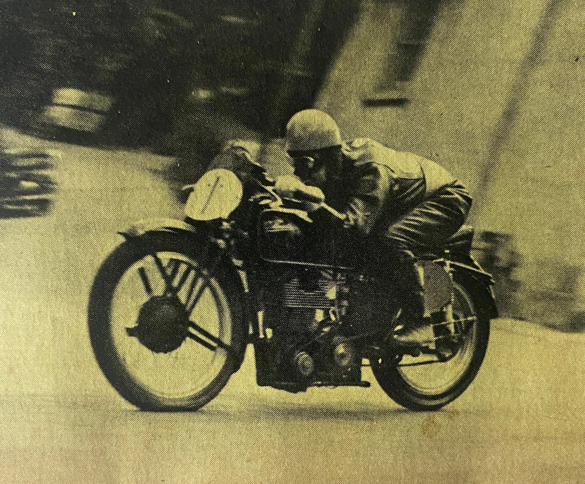 Vintage black and white photo of a motorcyclist racing on a classic motorcycle, featured in Cycle World Magazine March 1969.