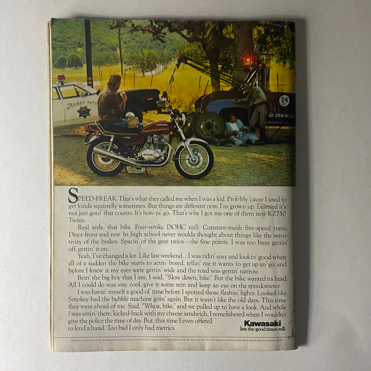 Back cover of Cycle World Magazine March 1976 featuring a Kawasaki KZ750 motorcycle, a scenic roadside scene, and narrative text about motorcycling culture.