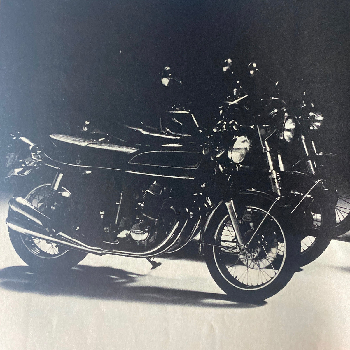 Cycle World Magazine September 1976 featuring a black and white image of Honda motorcycles, emphasizing the innovative designs of Honda's Automatic and Super Sport models.