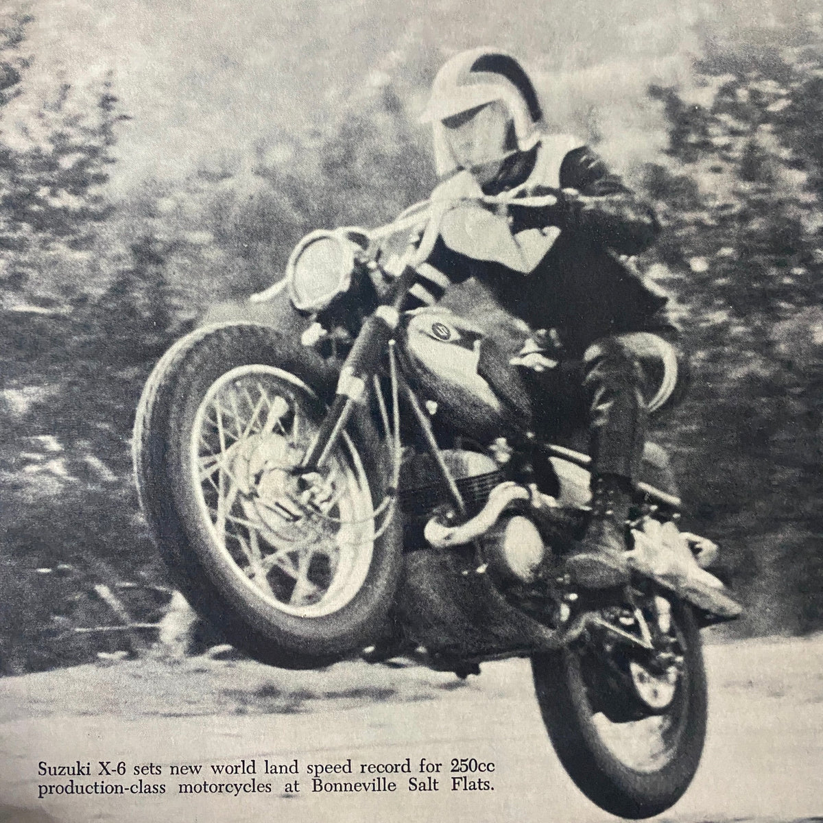 Vintage image from Motorcyclist Magazine January 1967 No. 836 showcasing a Suzuki X-6 motorcycle setting a world land speed record for 250cc production-class motorcycles at Bonneville Salt Flats.