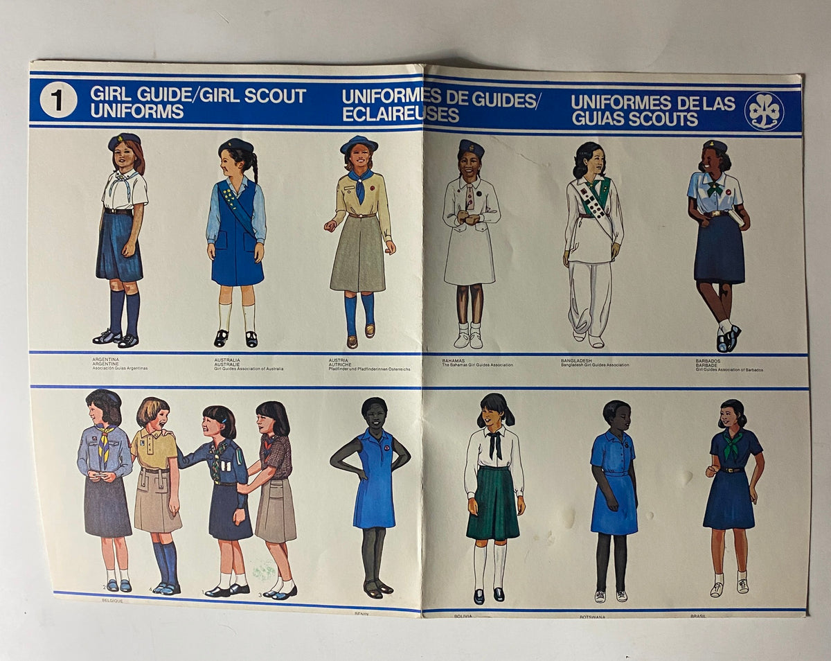 Illustrations of Girl Scout uniforms from the 1980 Uniform of the Girl Scout and Brownie Scout Equipment Catalog #1, featuring outfits from various countries including Argentina, Australia, and Bolivia.