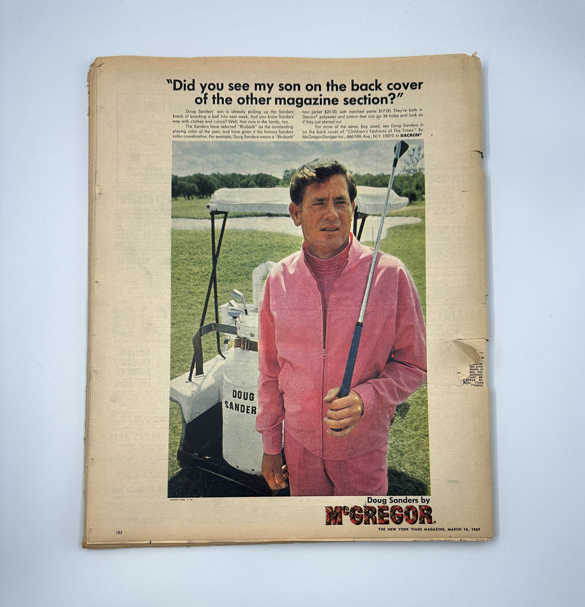 The New York Times Magazine March 16, 1969 back cover featuring Doug Sanders in a pink ensemble with a golf club, accompanied by a playful quote about his son. The image highlights the magazine's vintage appeal and condition.