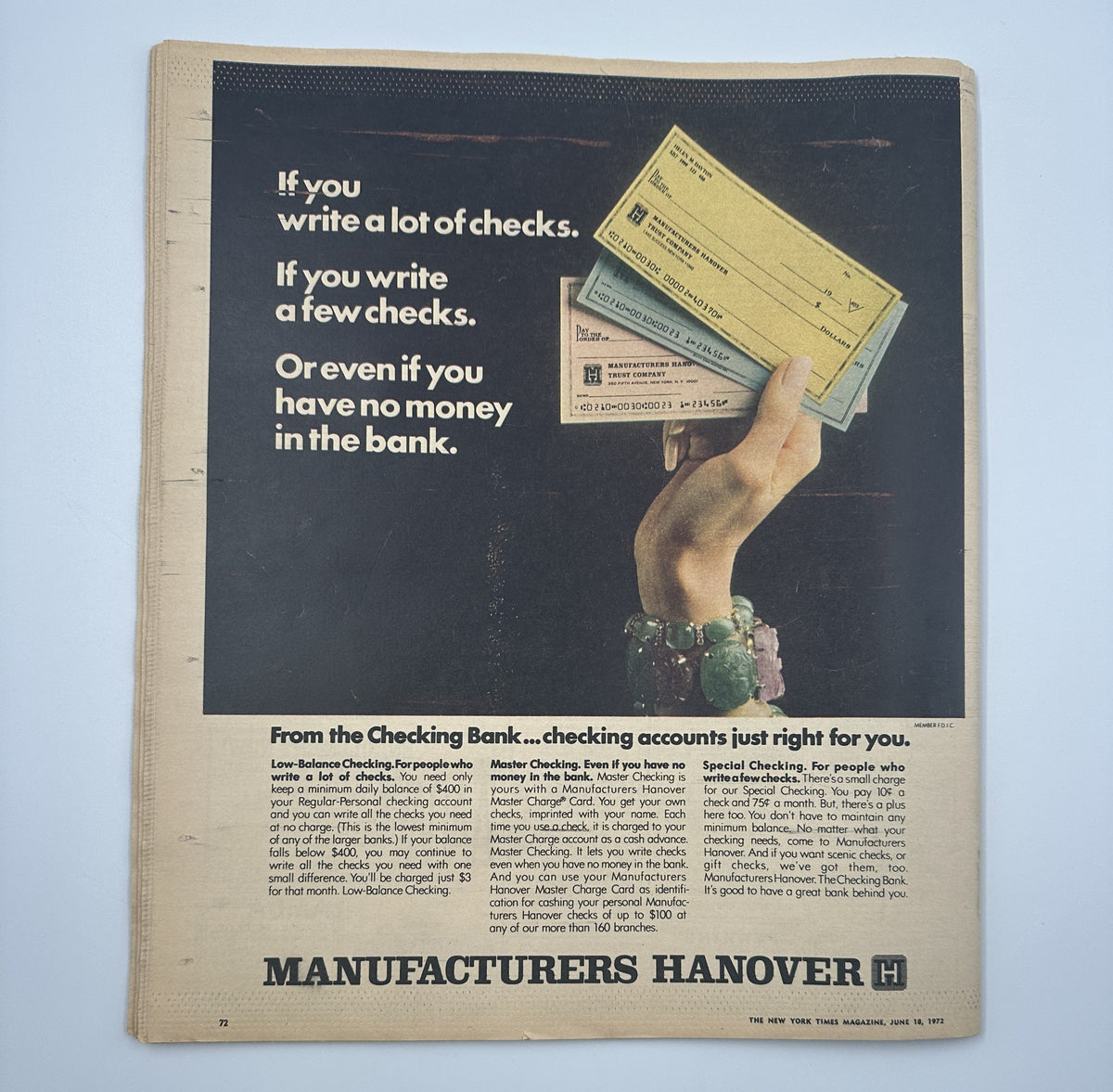 Advertisement in The New York Times Magazine, June 18, 1972, promoting Manufacturers Hanover bank services with a hand holding checks, emphasizing easy banking solutions.