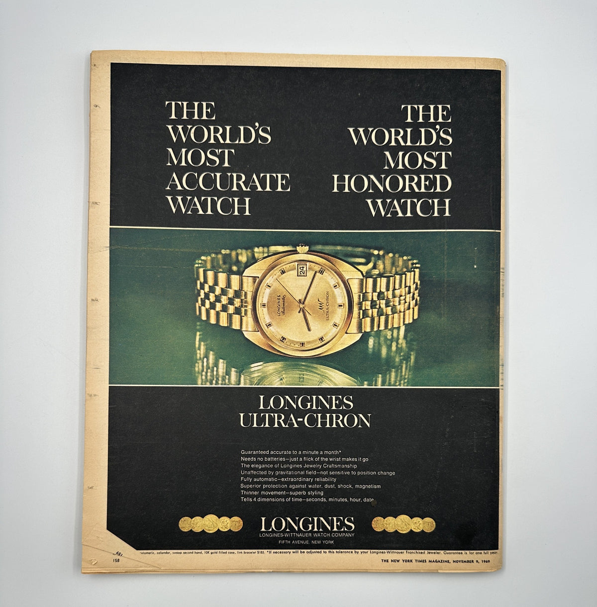 The New York Times Magazine November 9, 1969 cover featuring an advertisement for Longines Ultra-Chron watch, showcasing the world's most accurate and honored watch with a stylish gold watch on a dark background.