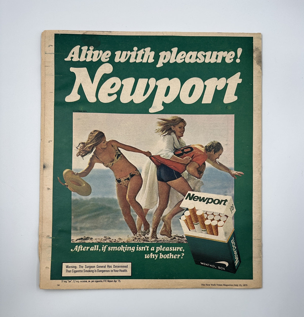 Cover of The New York Times Magazine dated July 13, 1975, featuring the headline 'Alive with pleasure! Newport' with an advertisement depicting beachgoers enjoying summer fun, promoting Newport cigarettes. This cover addresses the theme of the epidemic of flame in the South Bronx, highlighted in the magazine.